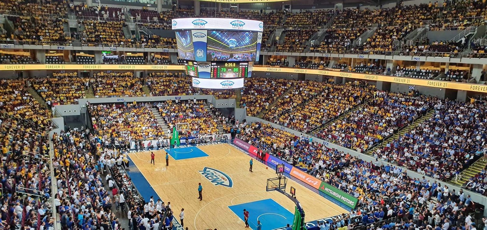 Players fight for the ball under the basket