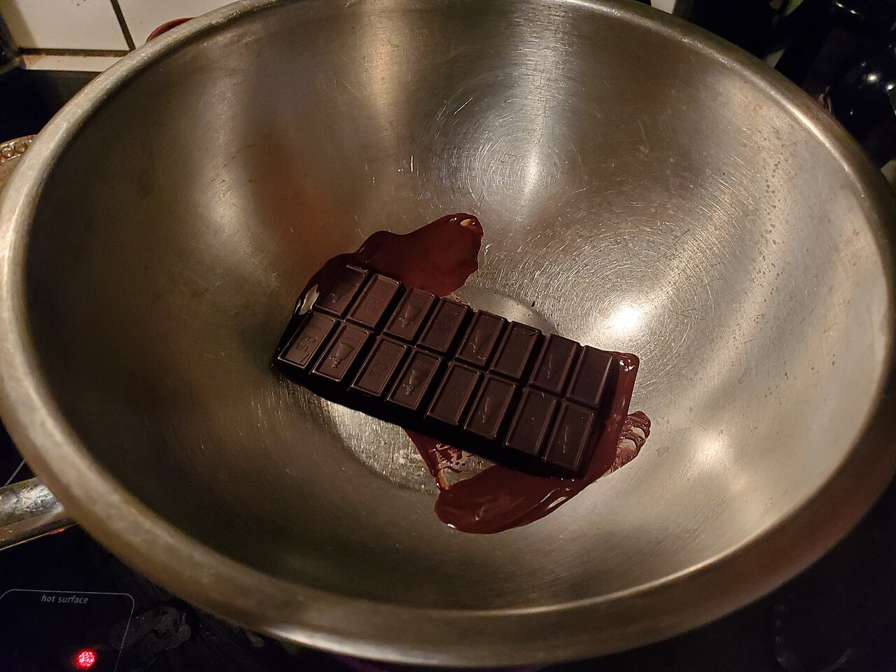 Chocolate melting in a double boiler over gentle heat
