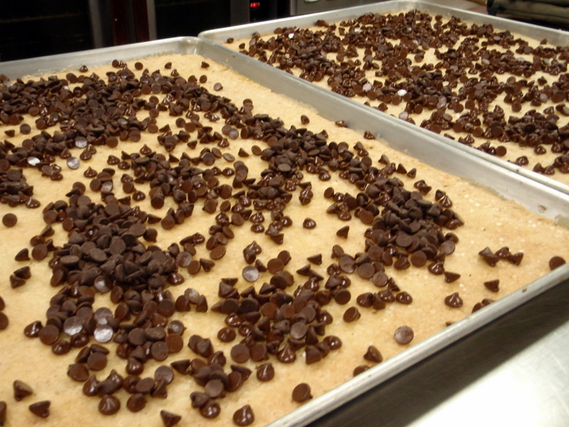 Chocolate chips melting in a bowl into a smooth liquid