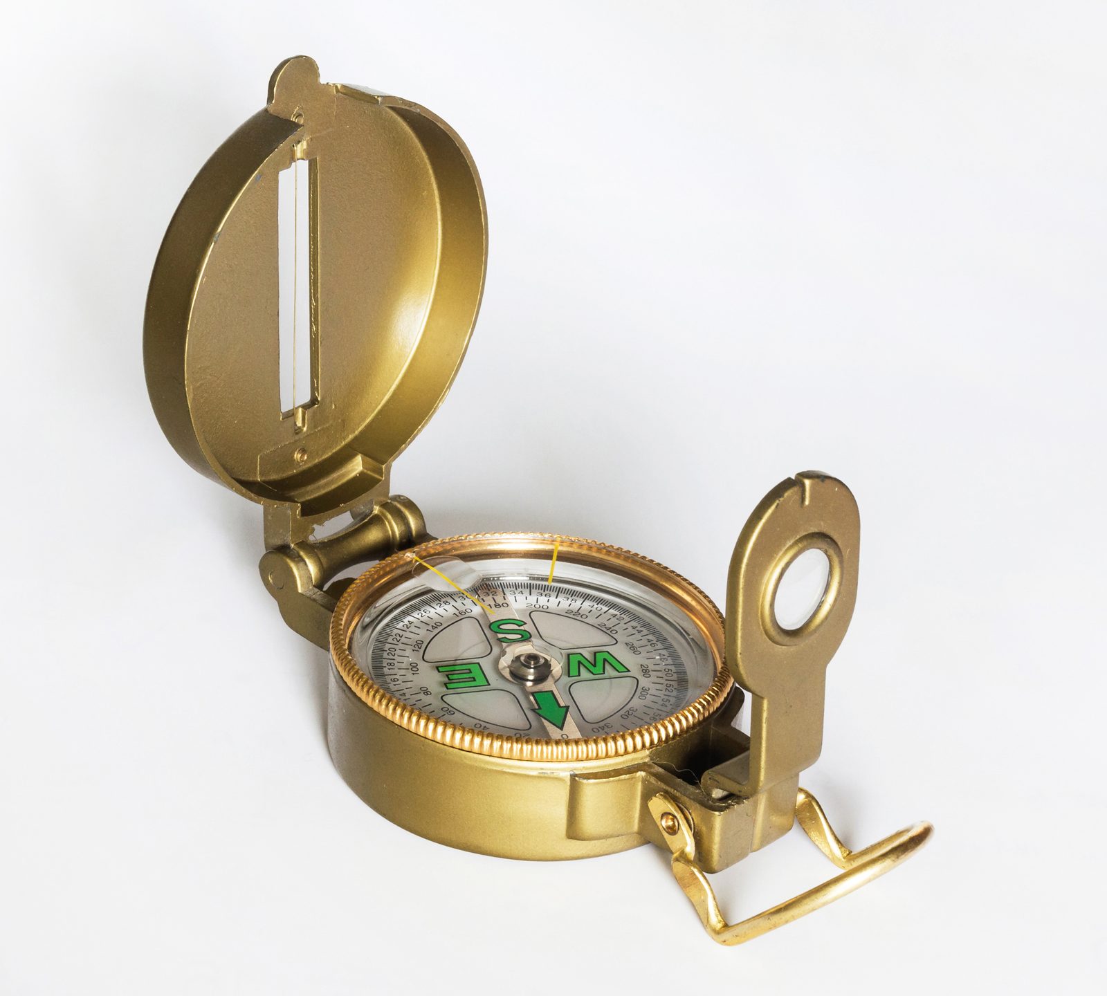 A hand-held baseplate compass used for map navigation