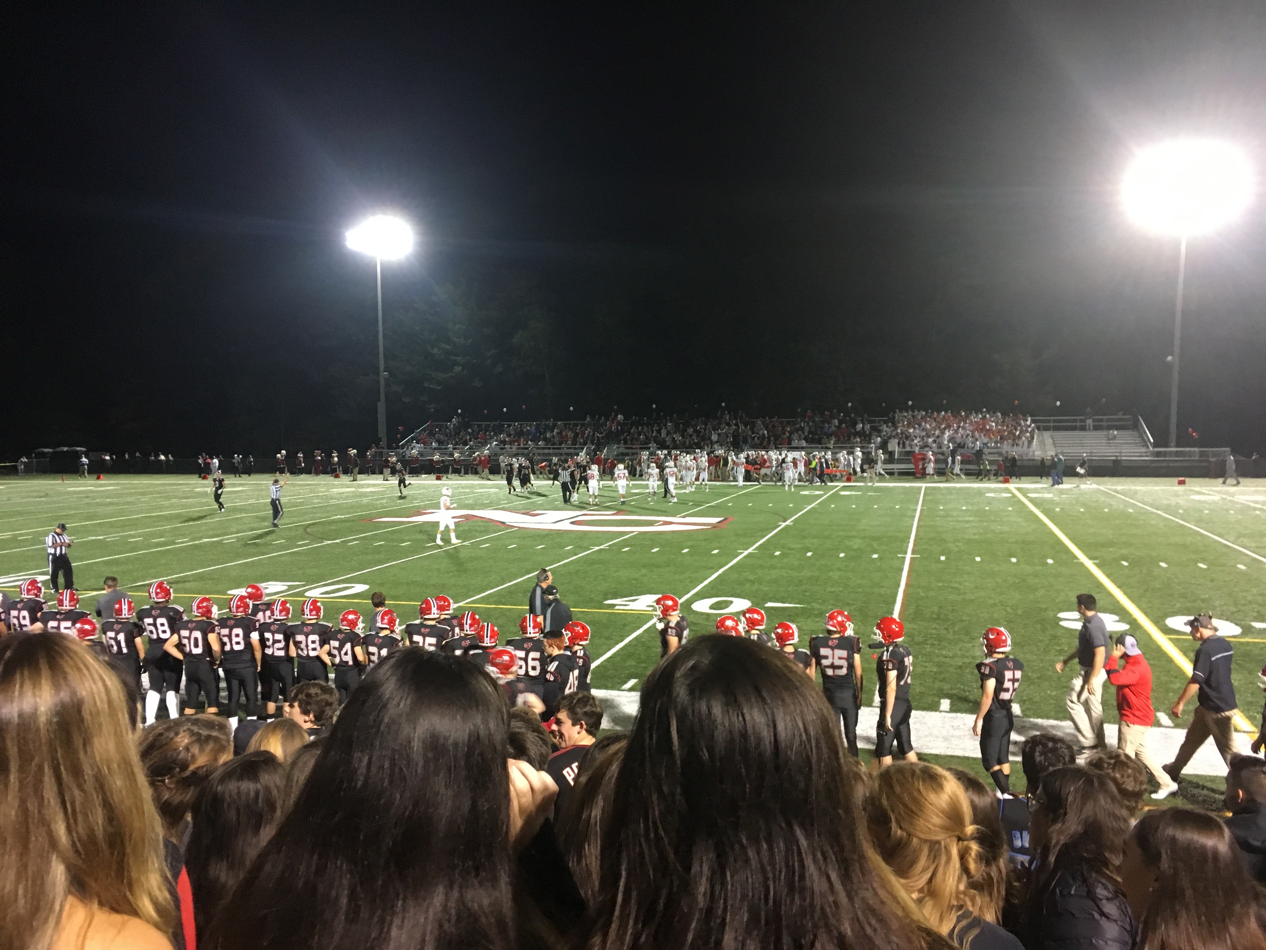Players line up for an American football game