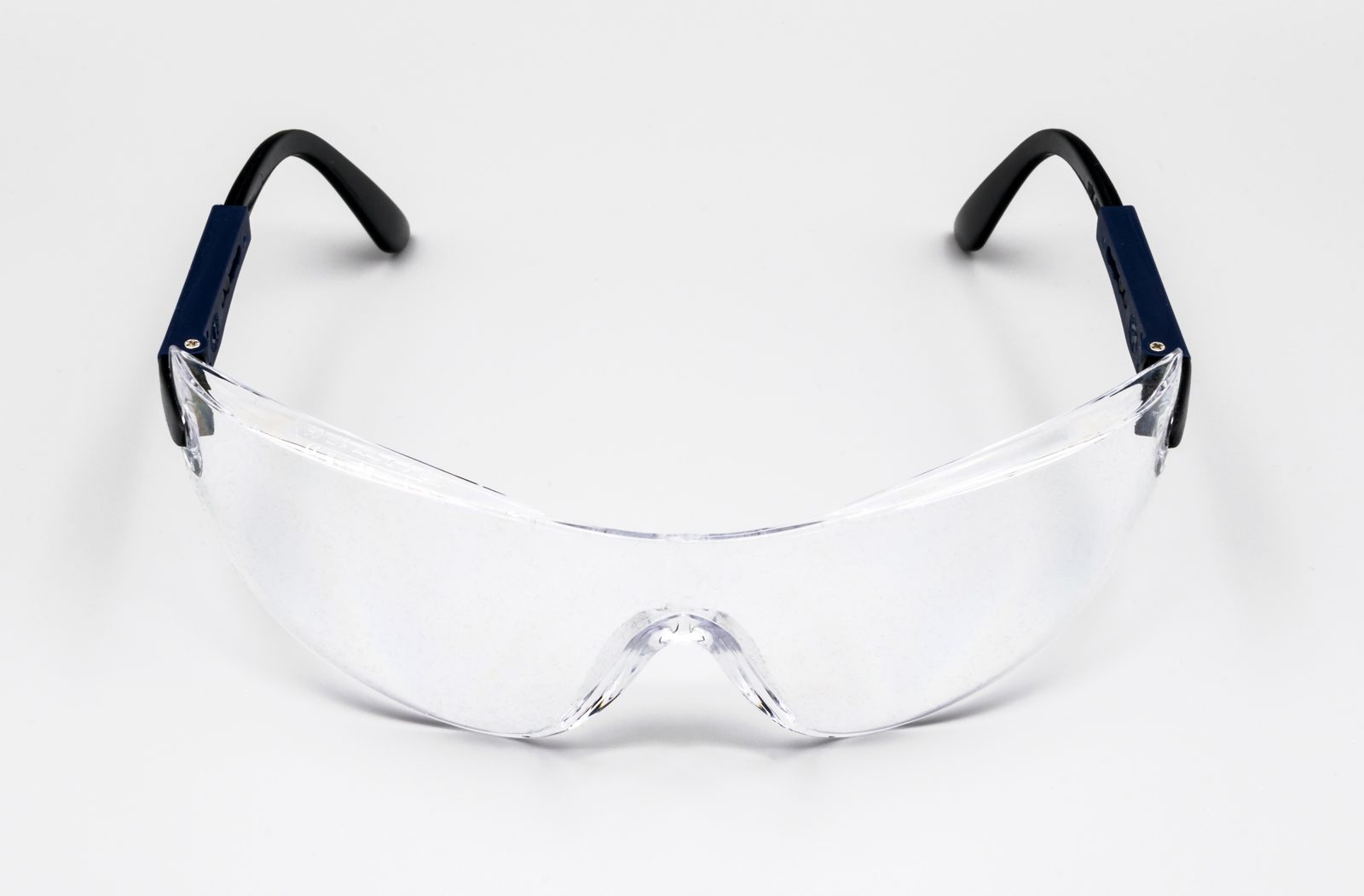 Protective goggles with a clear lens and dark frame, shown from the front
