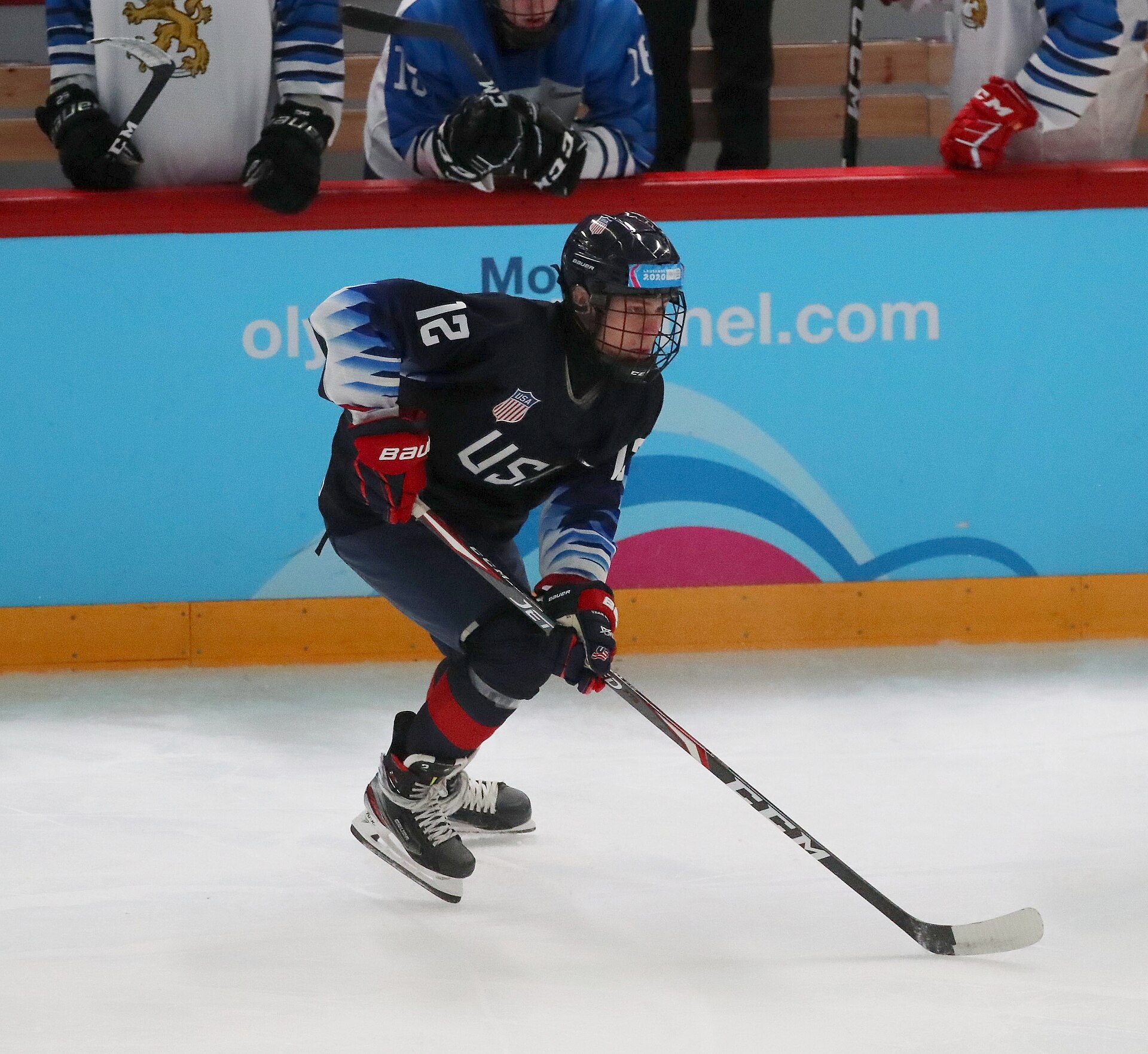 Ice hockey players battle on the ice during a game