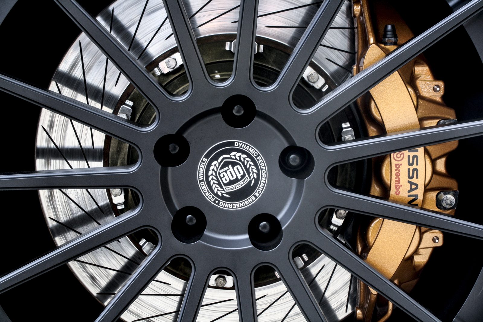A disc brake assembly on a car wheel, showing the disc and caliper