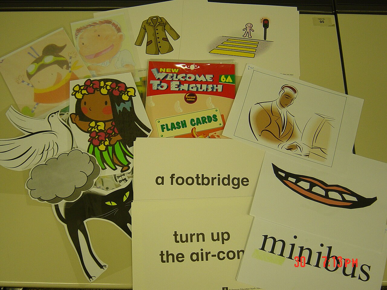 Sample English flashcards laid out on a table