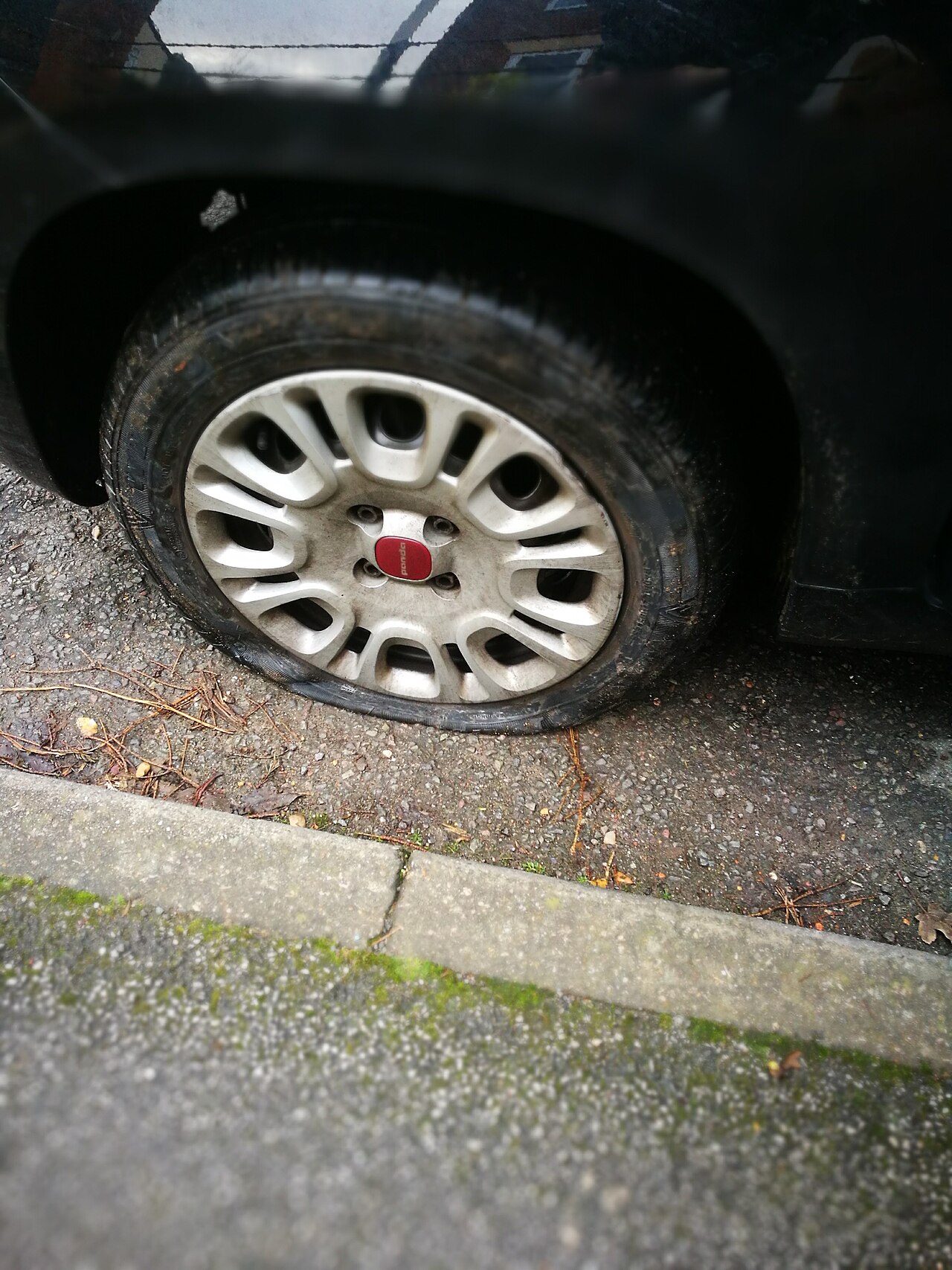 A flat tire on a Fiat Panda
