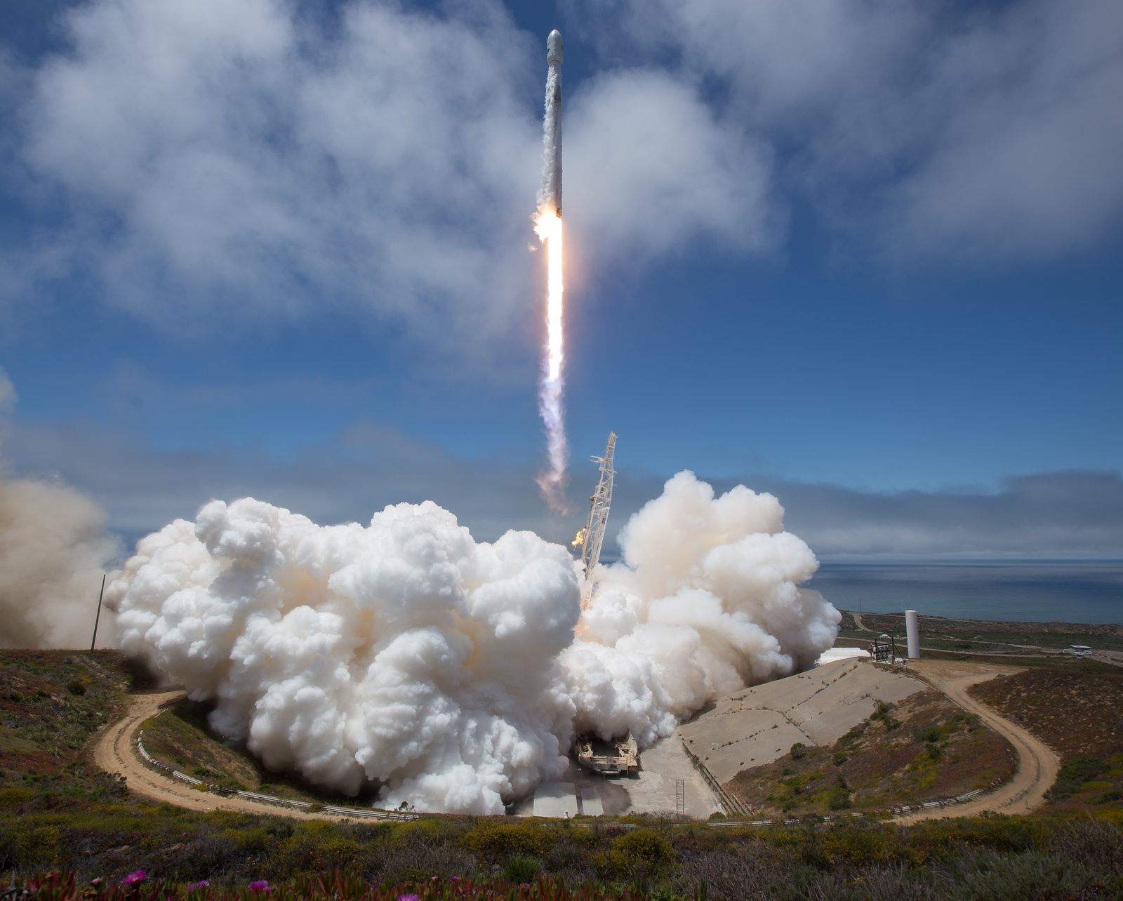A Falcon 9 rocket launches into the sky