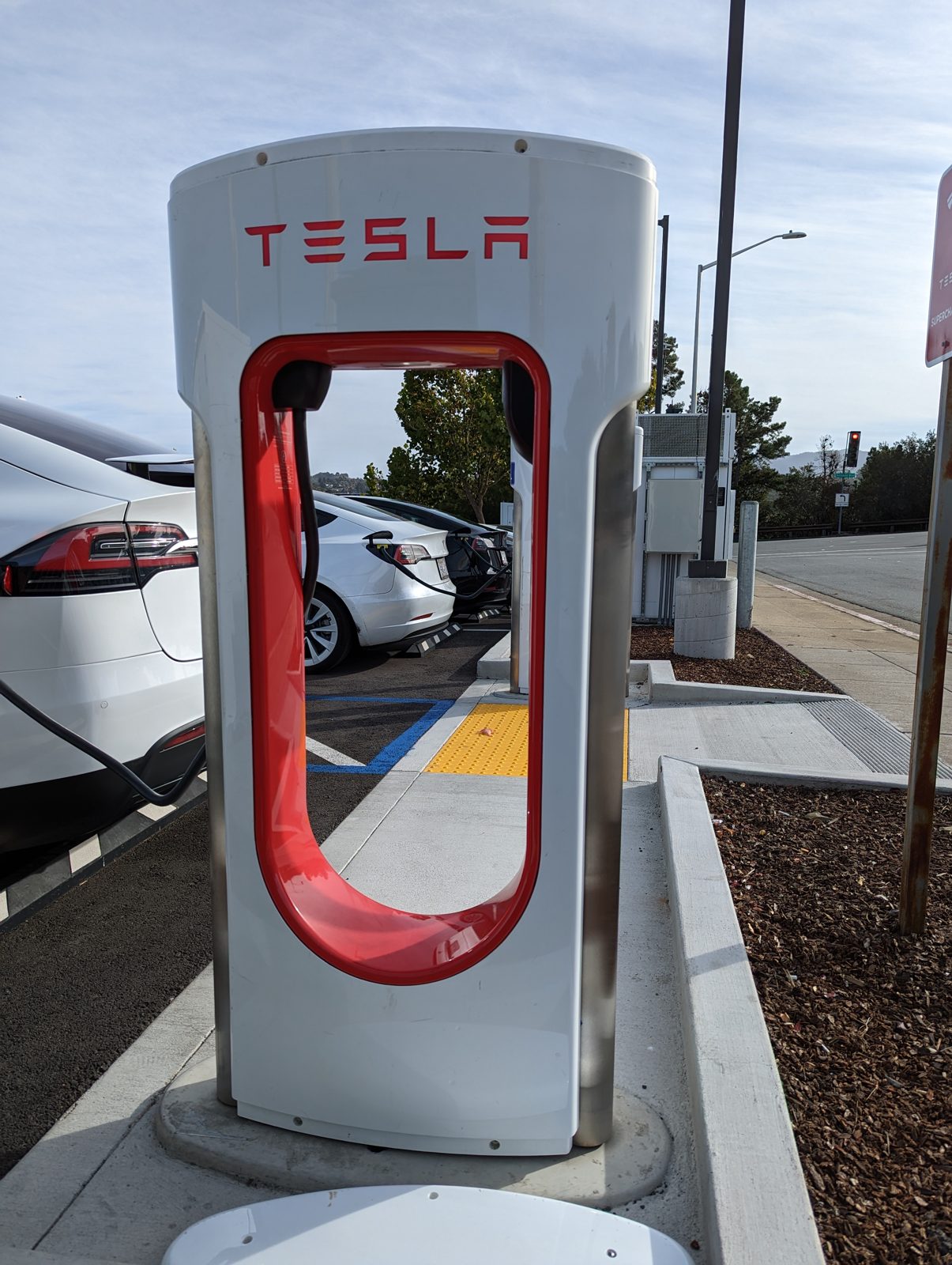 A Tesla Supercharger stall at a charging station