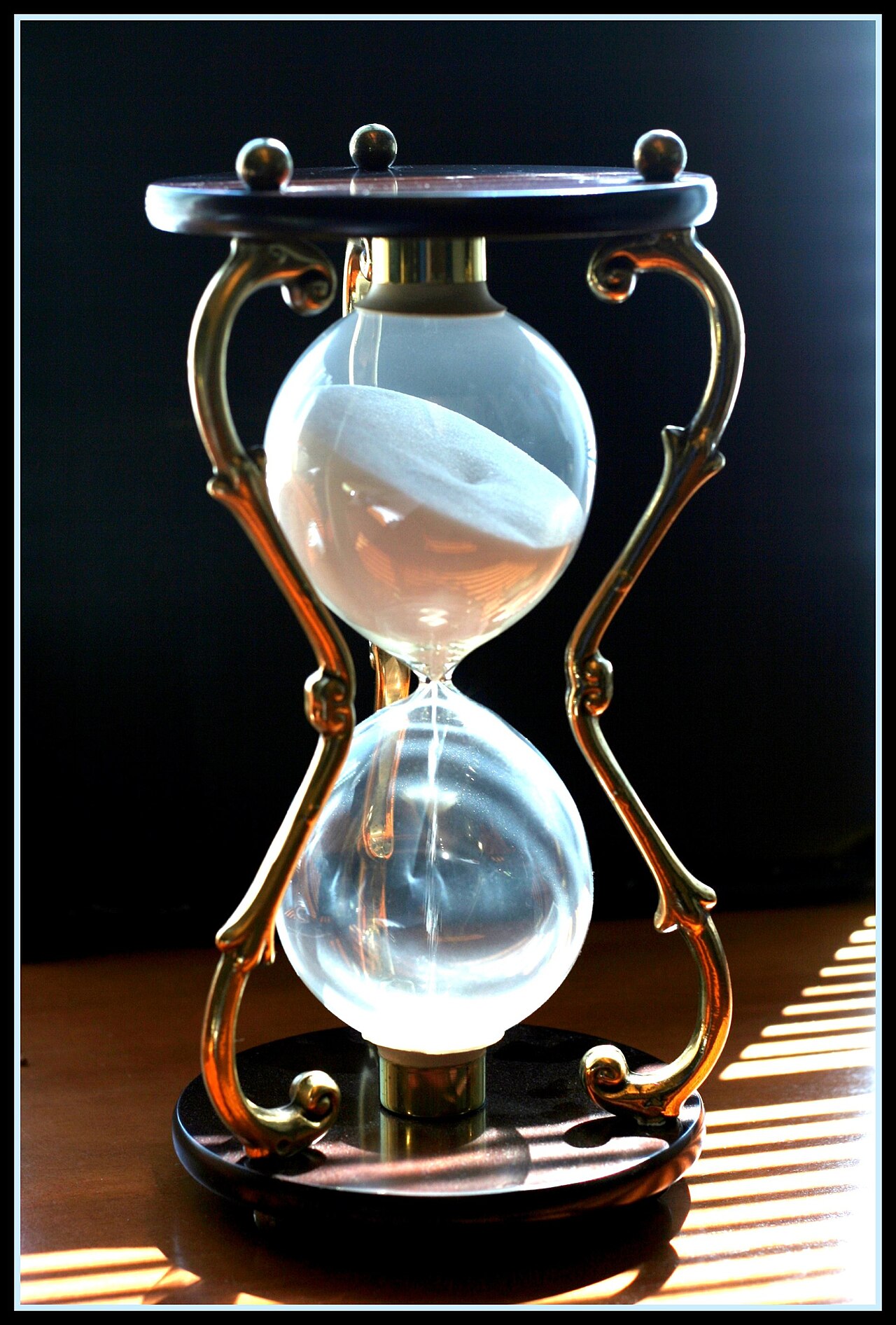 An hourglass filled with sand