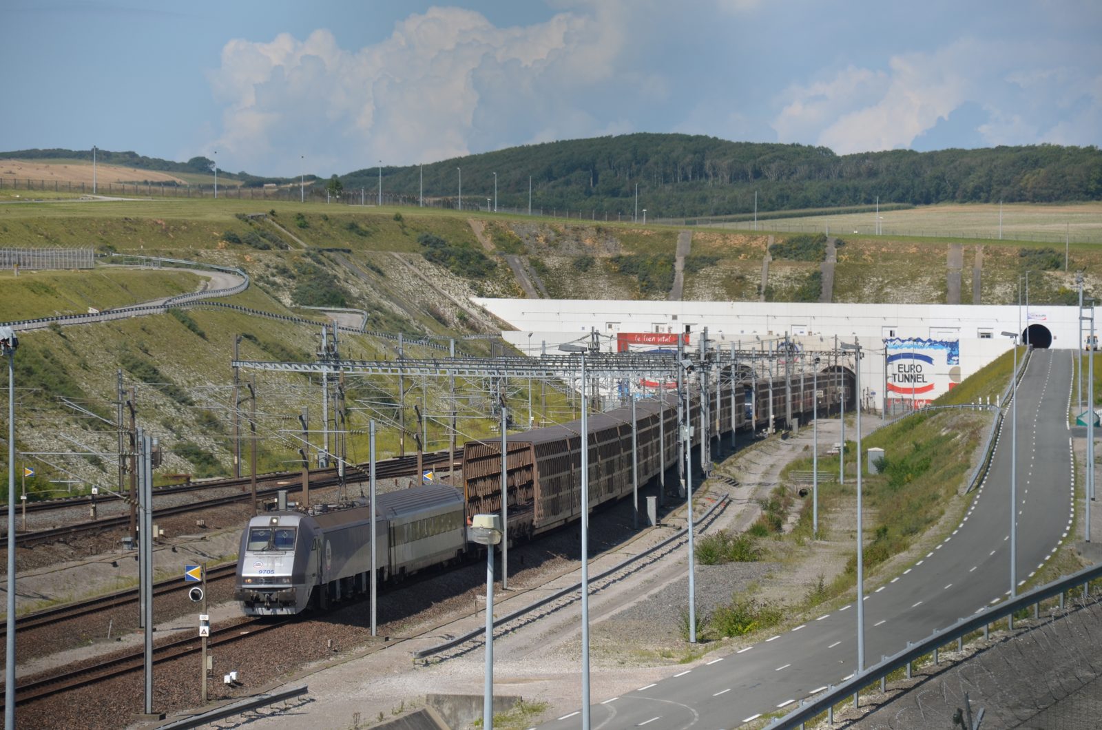 A Eurotunnel train leaves the tunnel at Coquelles in France