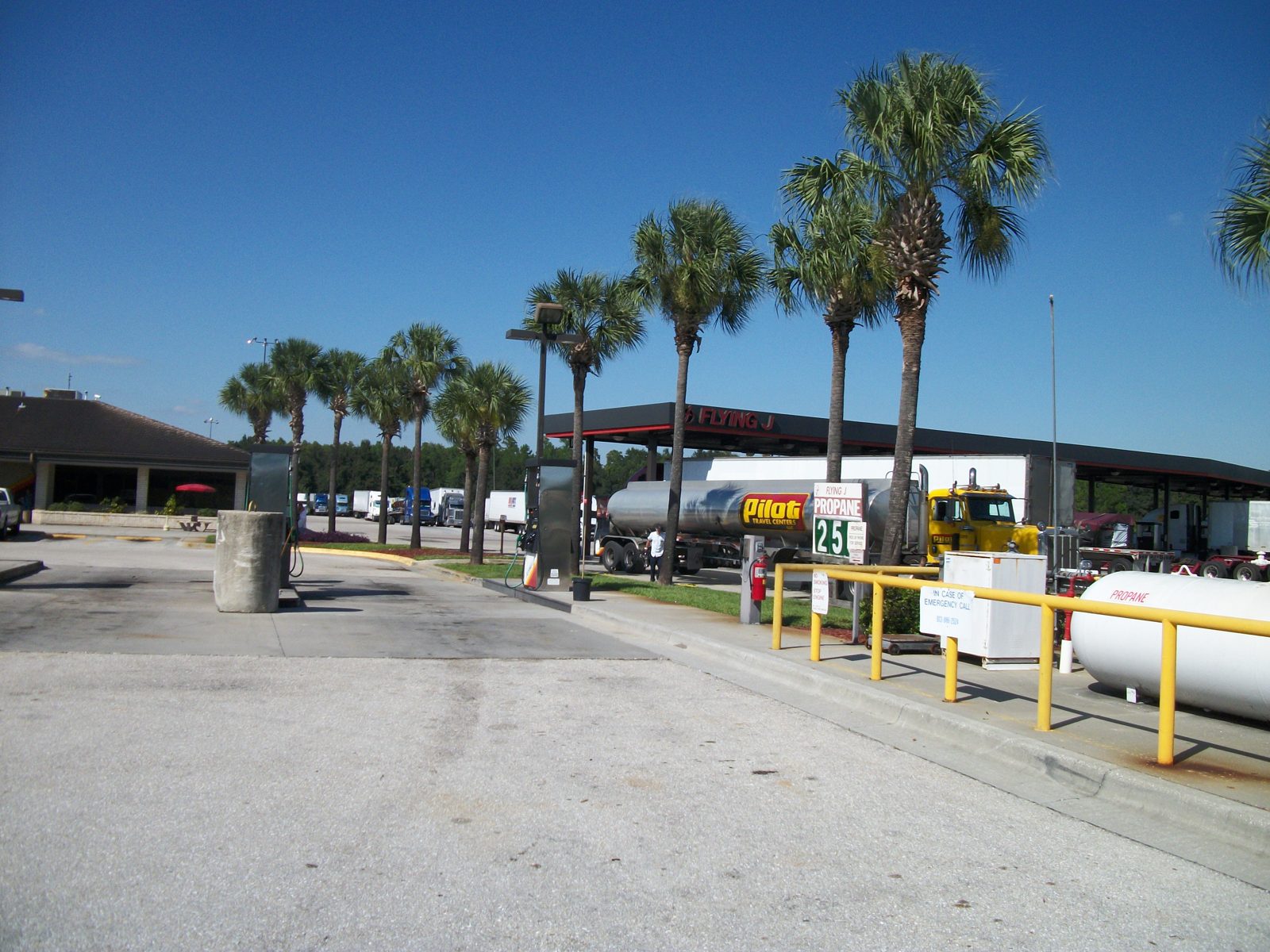 A fuel tanker truck at a truck stop
