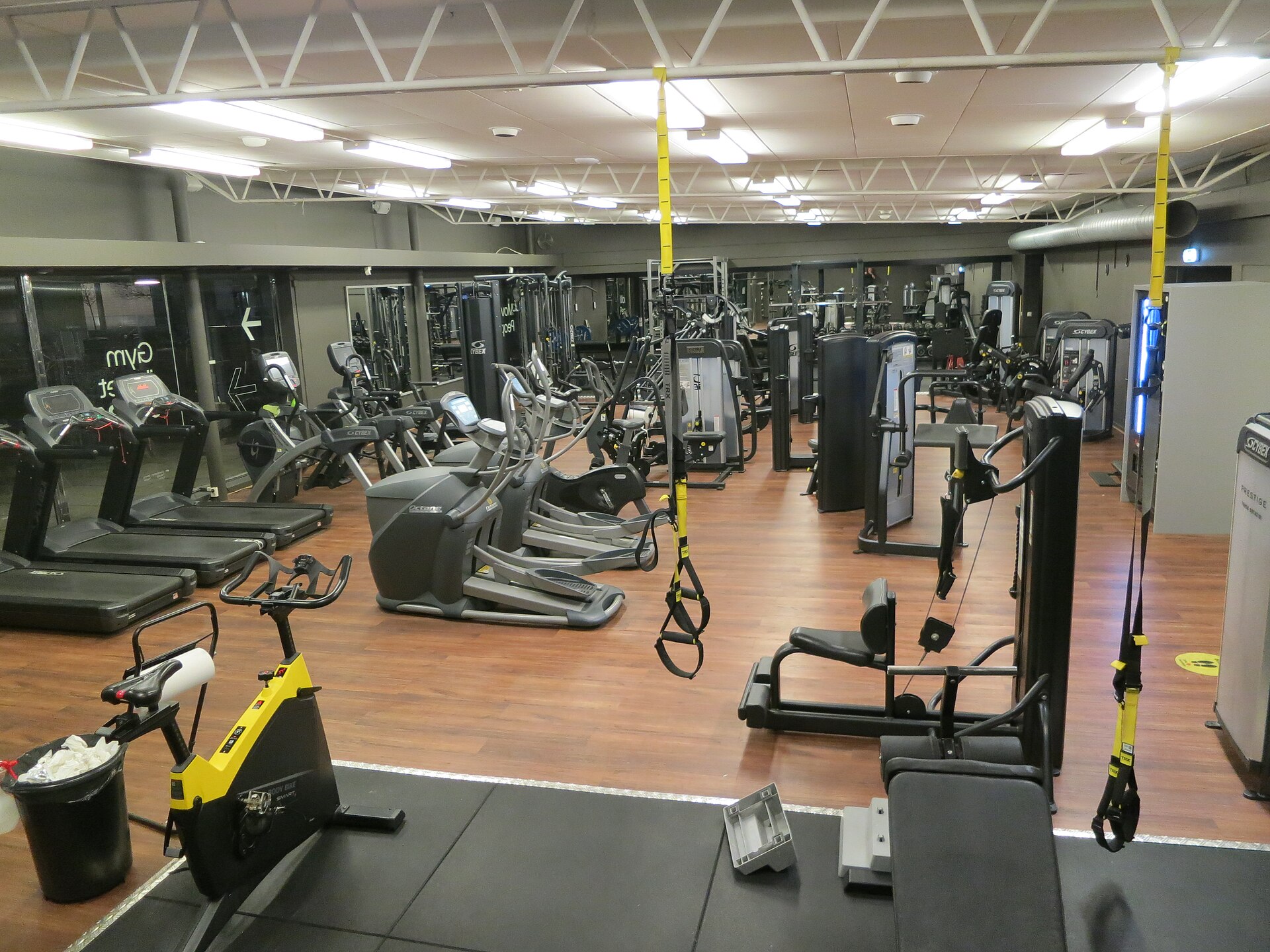A bright modern health club with exercise machines