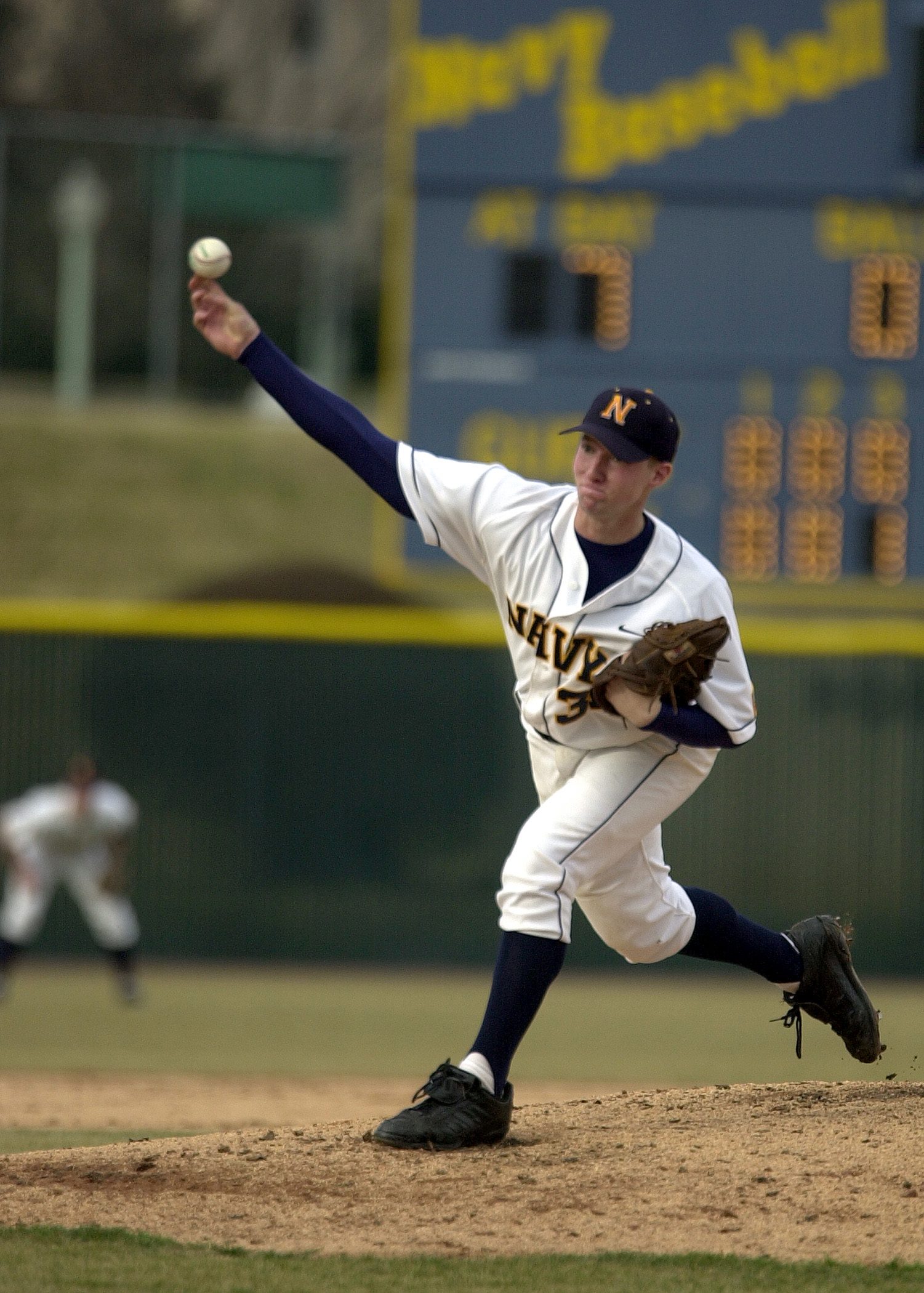 A pitcher releases the ball during a baseball game