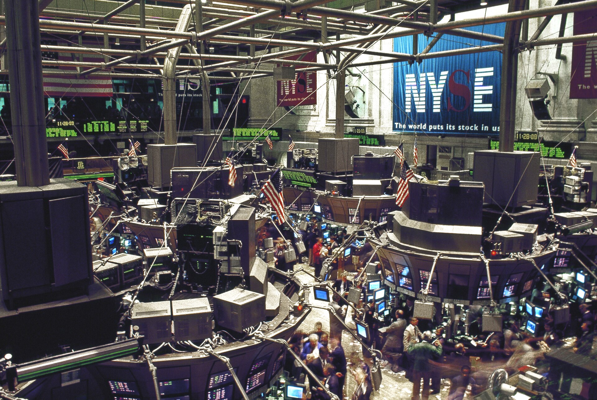 Traders work on the floor of the New York Stock Exchange