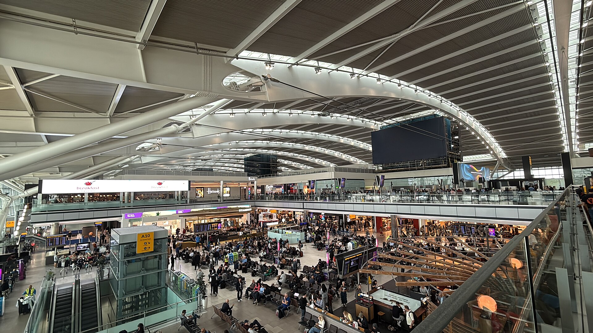 The outside of a large airport terminal building