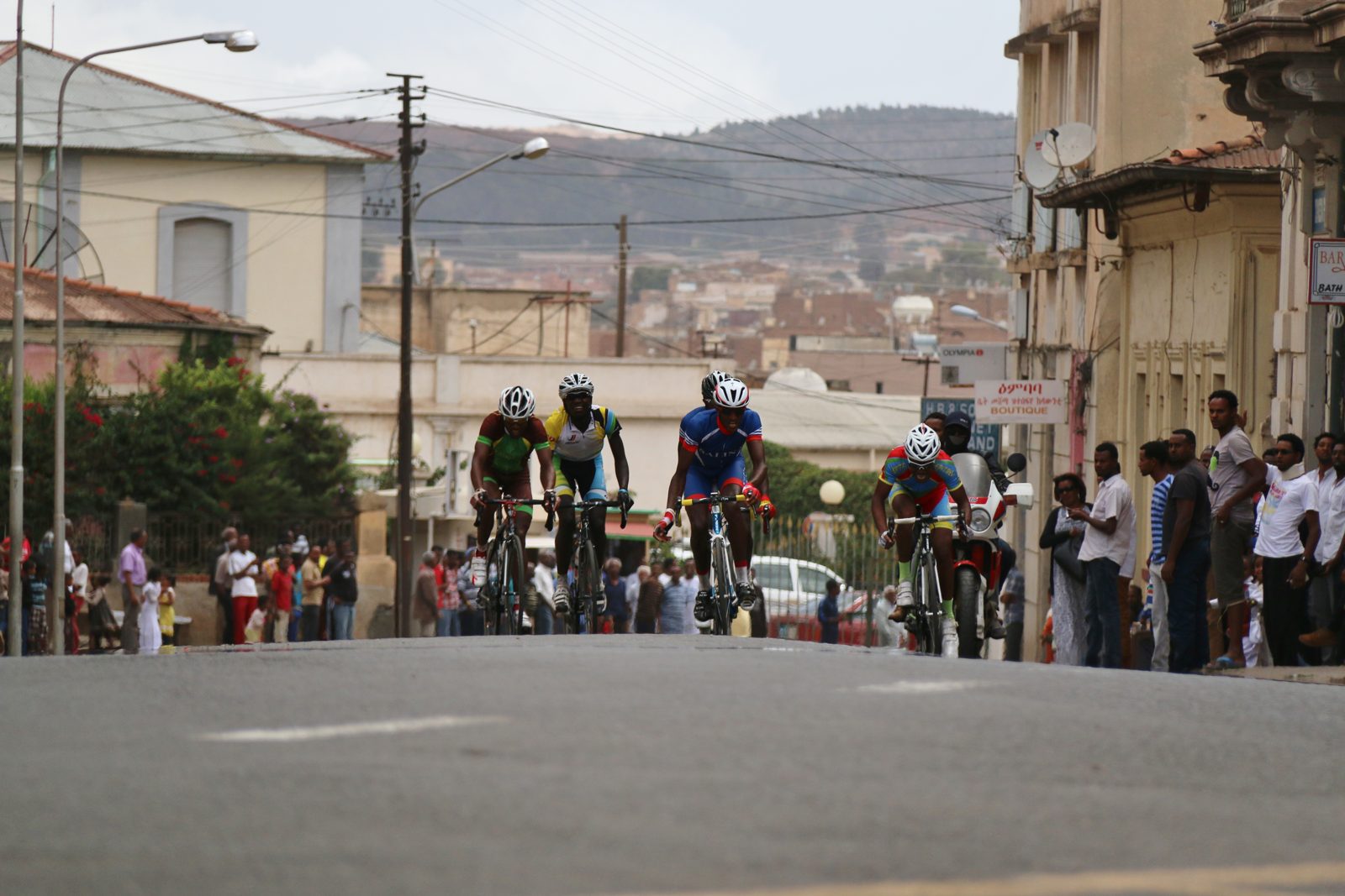 Cyclists race through the streets of Asmara