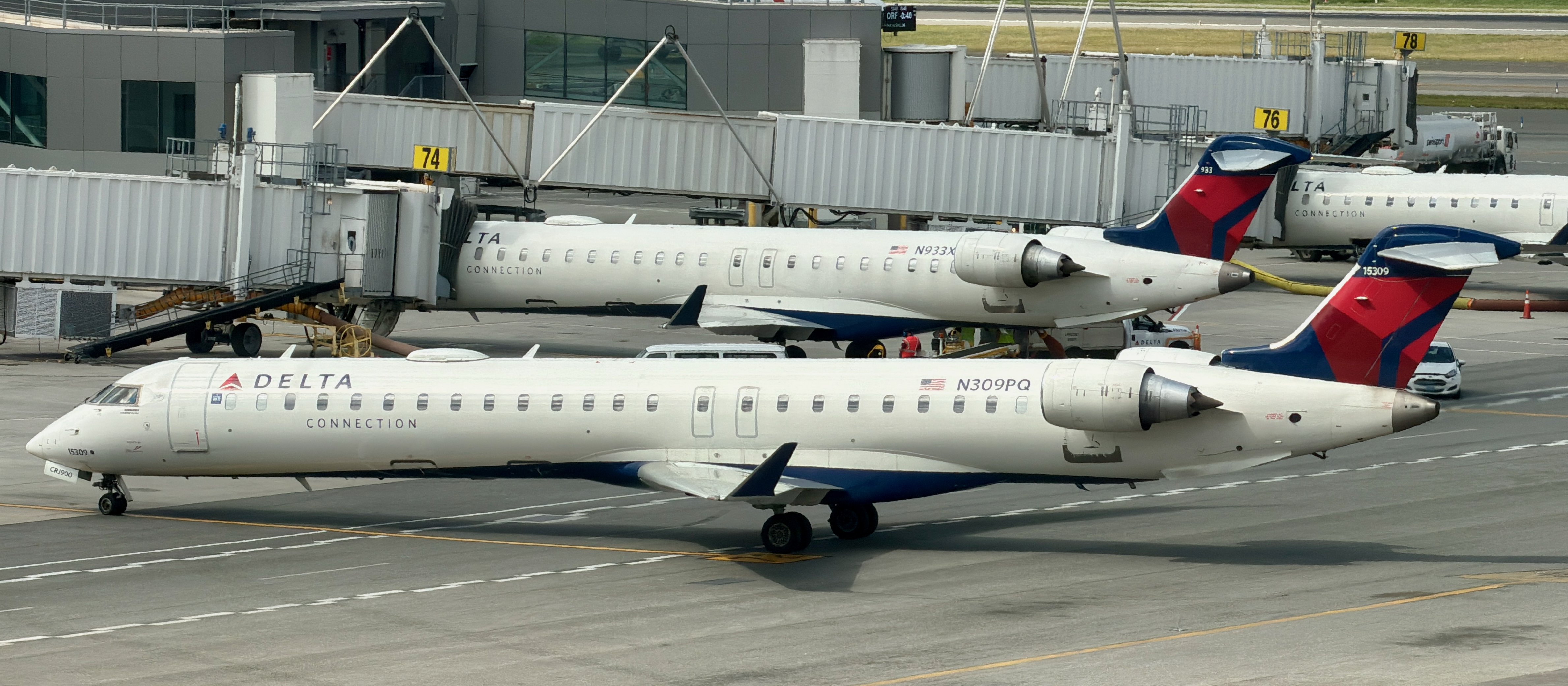 A Delta Connection CRJ-900 jet on the ground