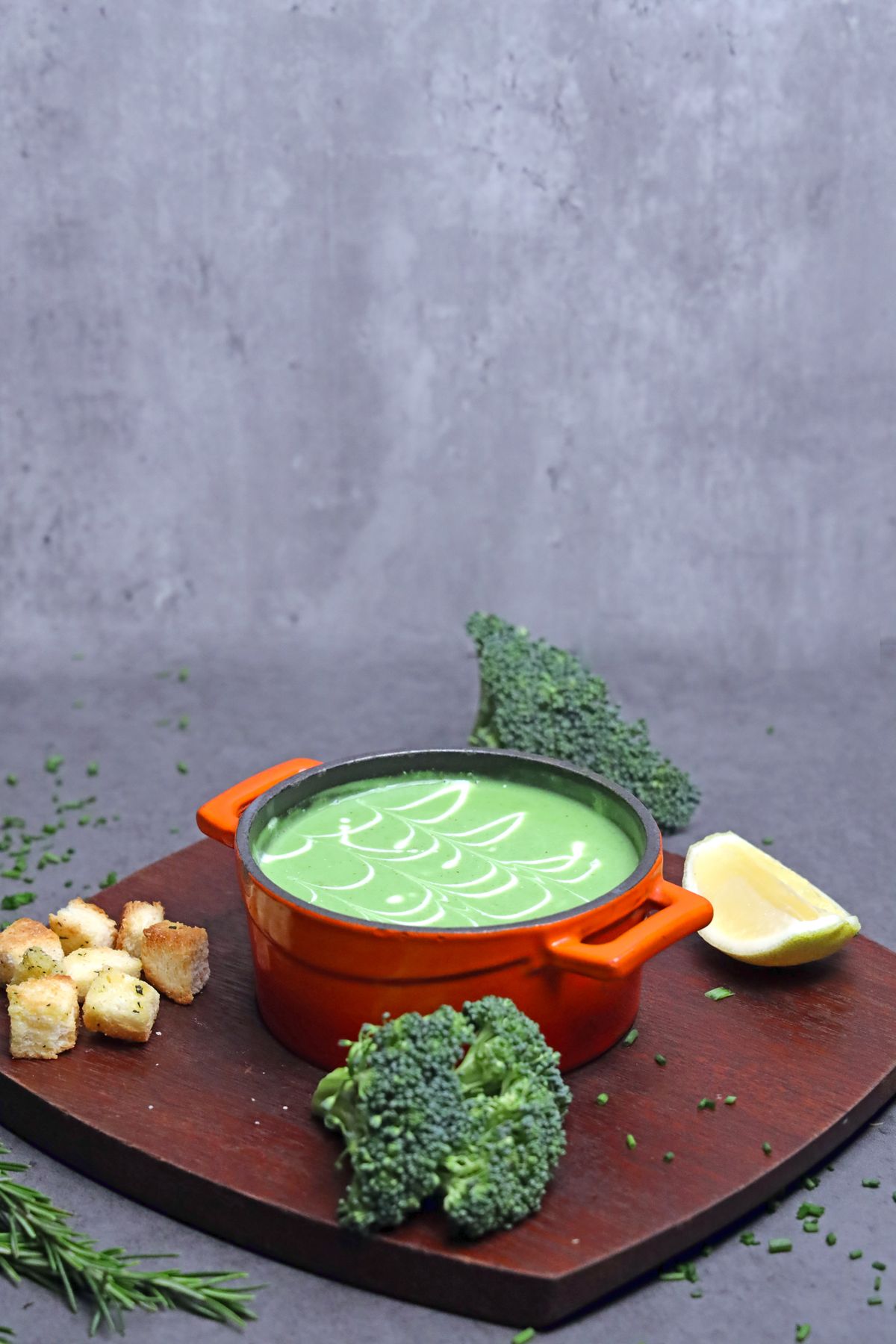 Cream of broccoli soup in an orange soup pot