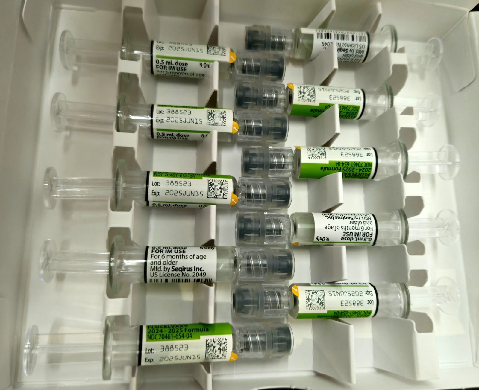 A pack of flu vaccine syringes