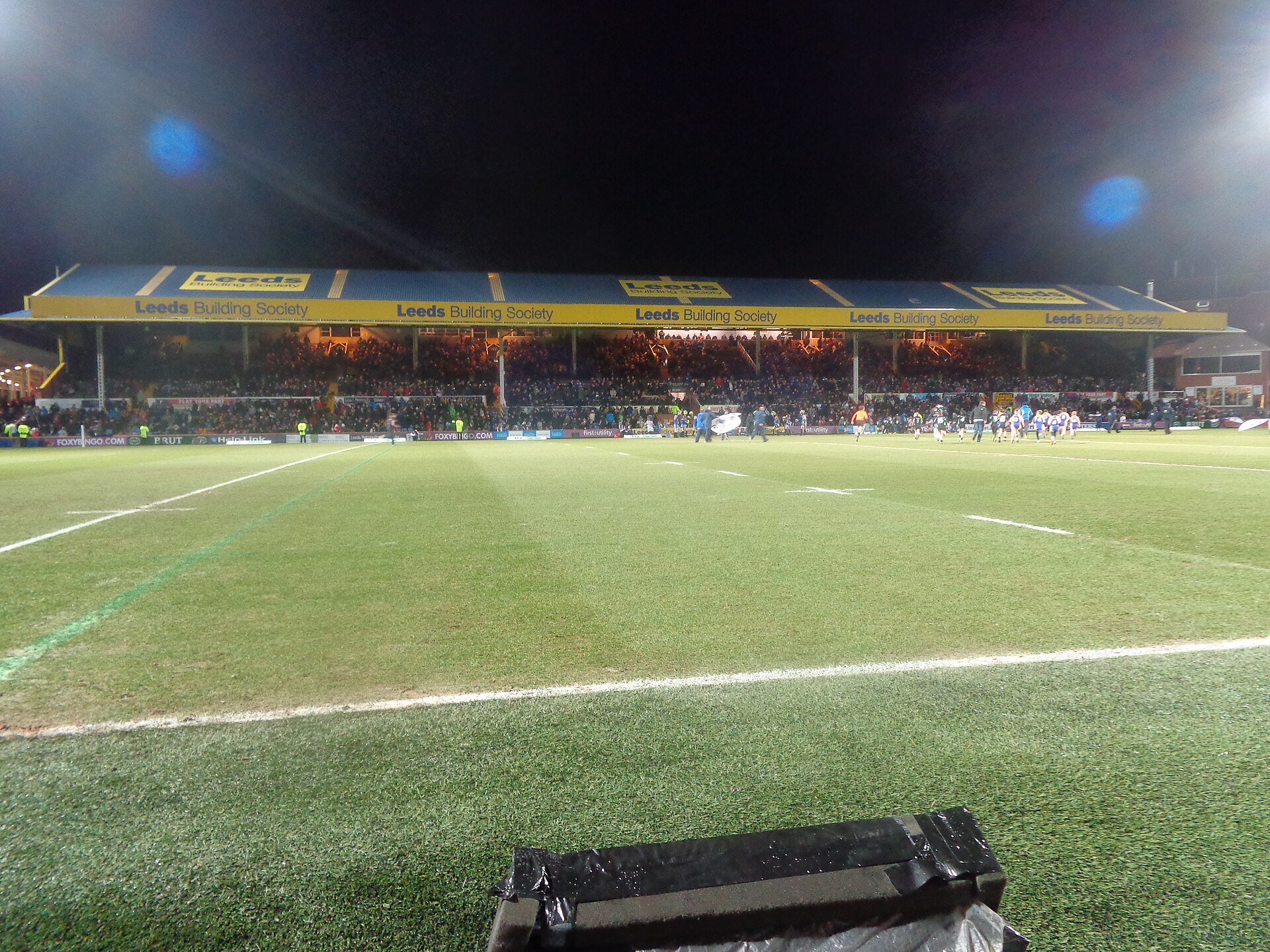 Fans watch a rugby league match at Headingley Stadium in England