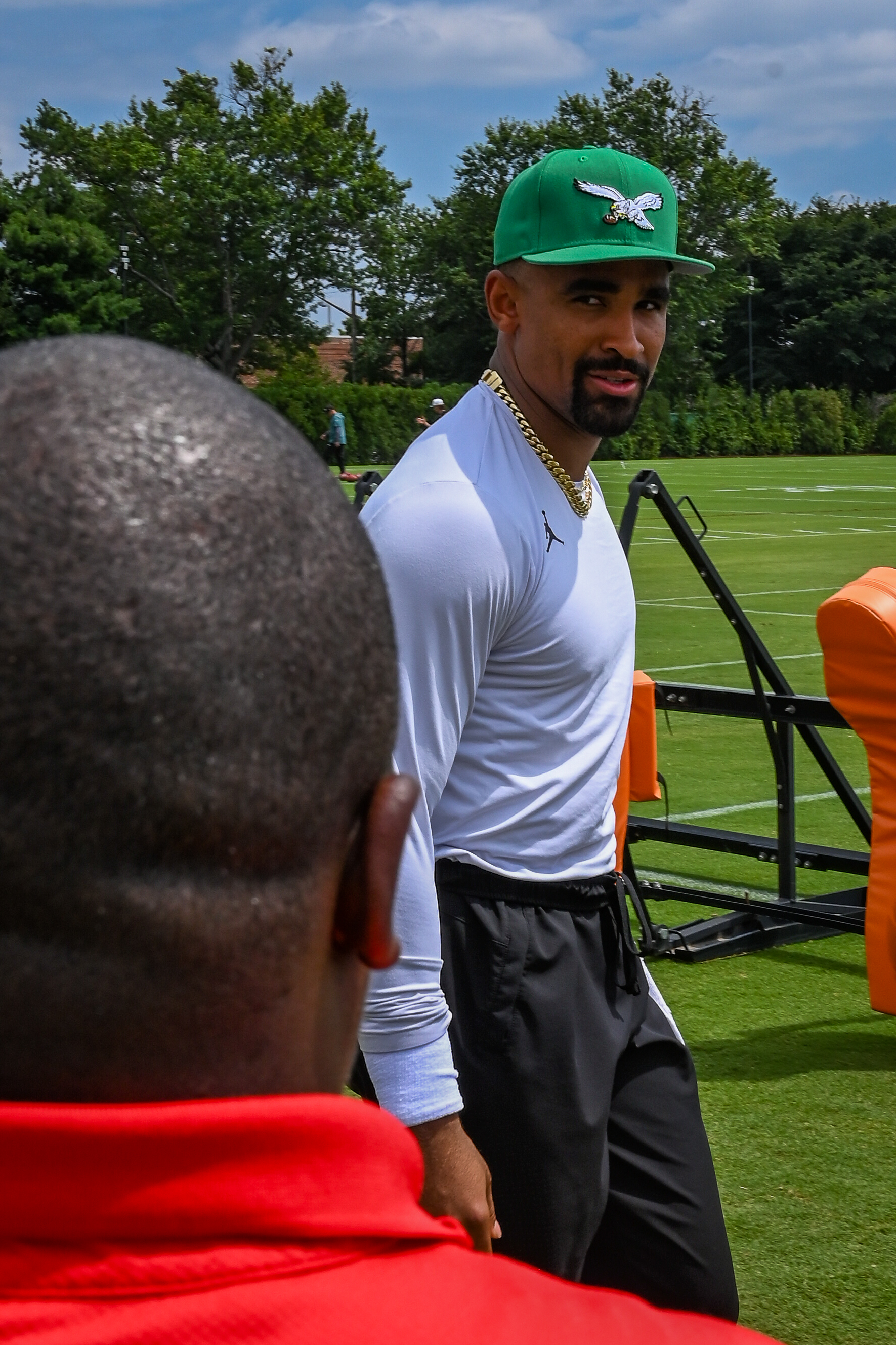 Jalen Hurts walks onto the field during Philadelphia Eagles training camp