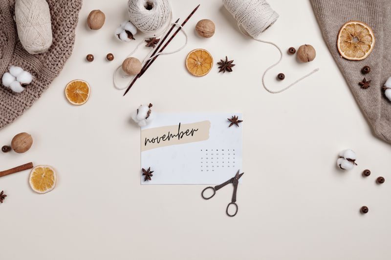 A calendar page lying on a work desk