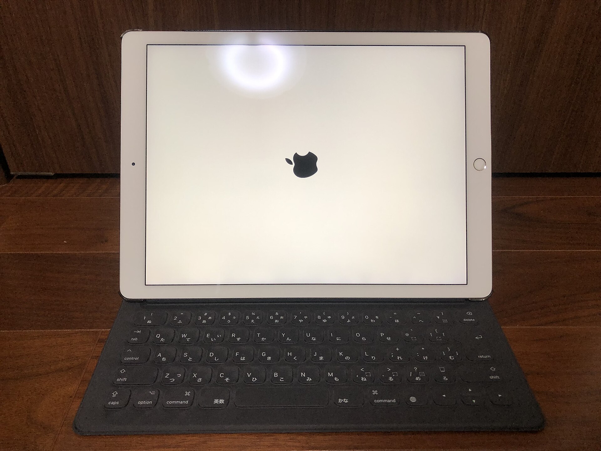 A tablet with a keyboard on a table