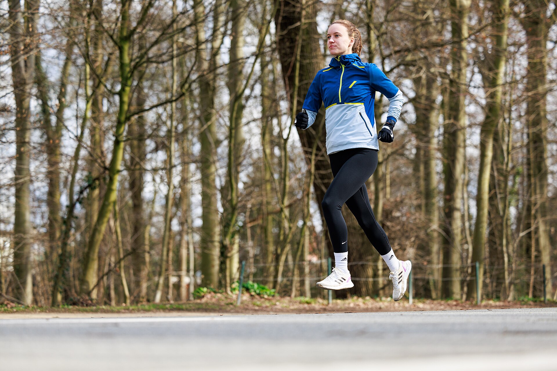 A person running on a path in a park in Brussels