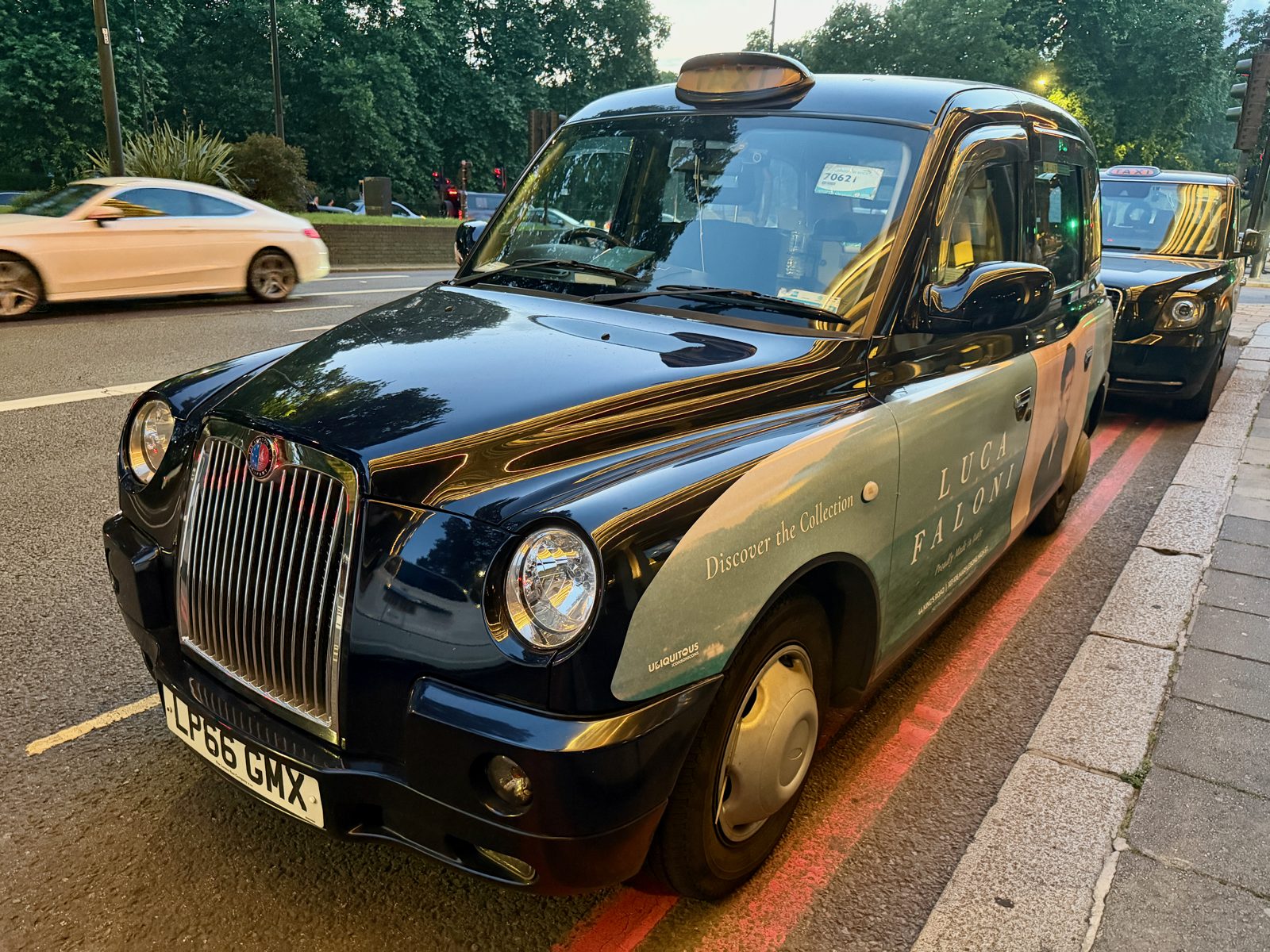 A London black taxi cab on a city street