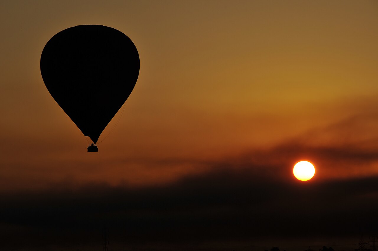 A hot air balloon drifting over Luxor in Egypt