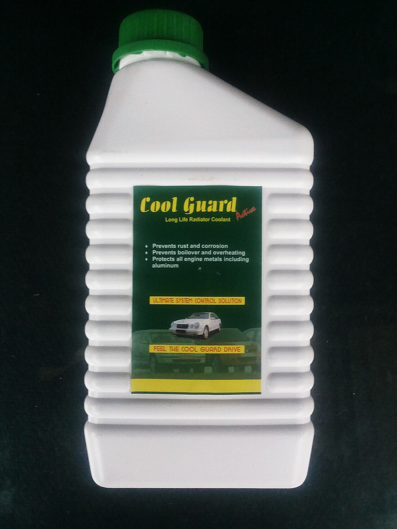 A bottle of coolant photographed up close