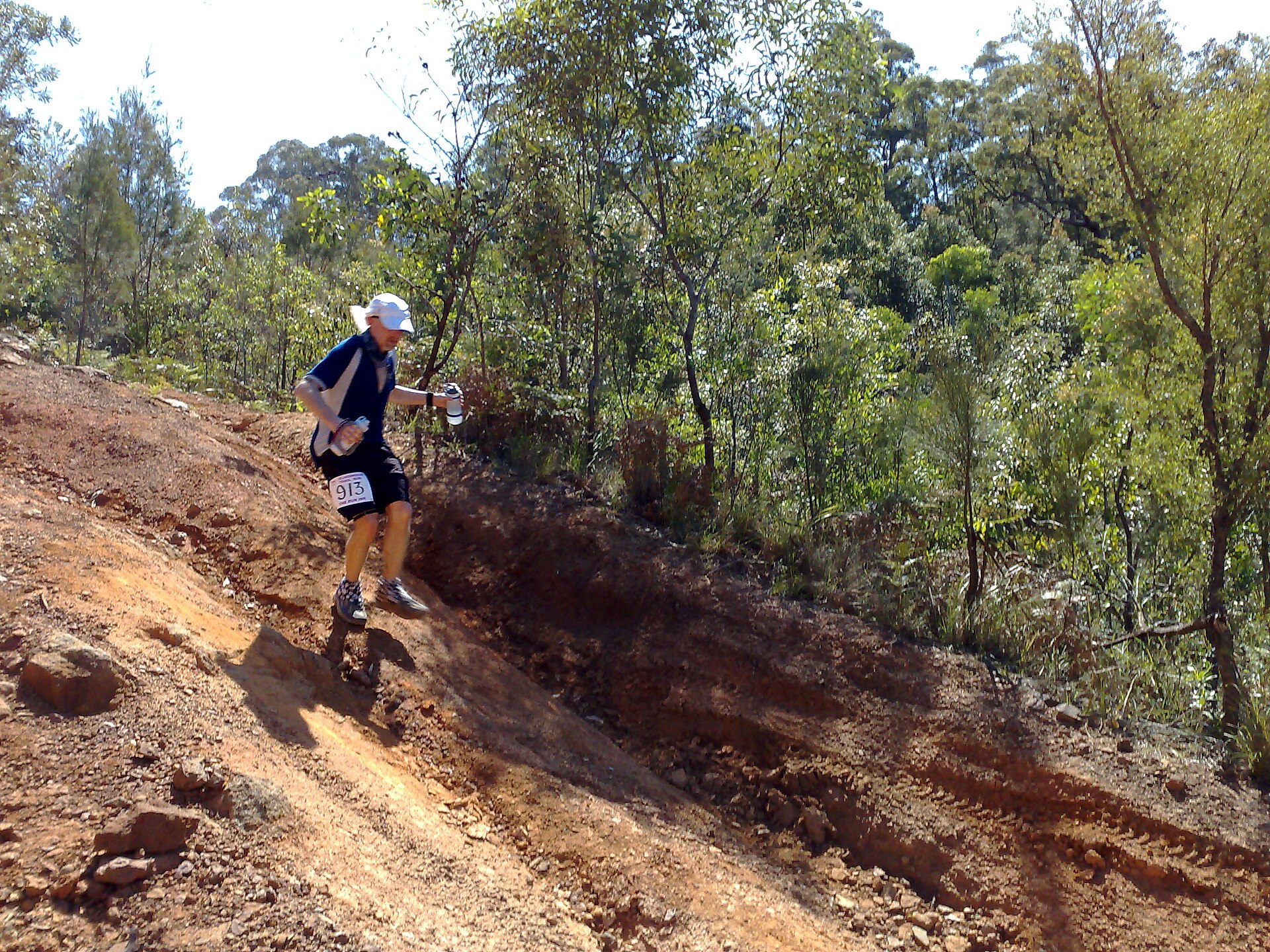 A runner on a mountain trail
