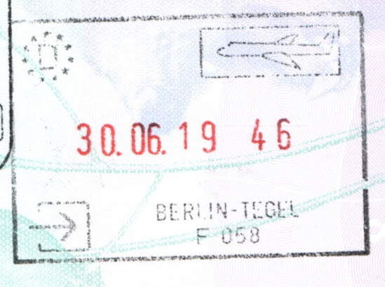 A Berlin-Tegel entry stamp in a passport