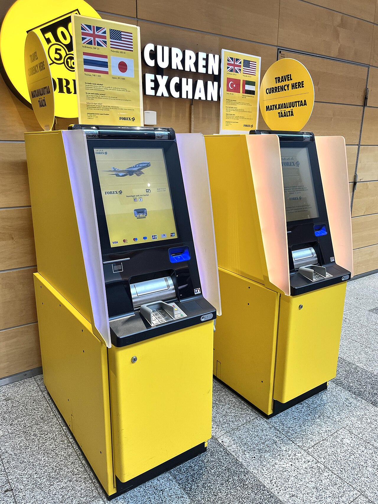 A currency exchange machine in a station, an option that often carries wide spreads