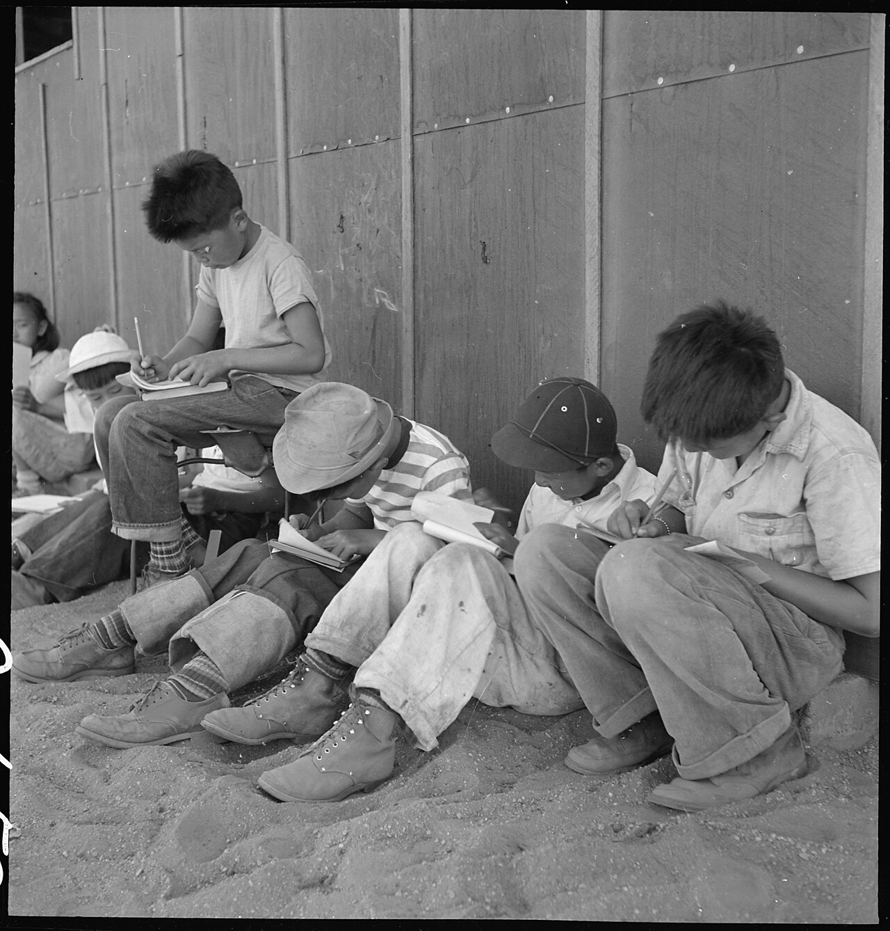Students studying their lessons at their desks