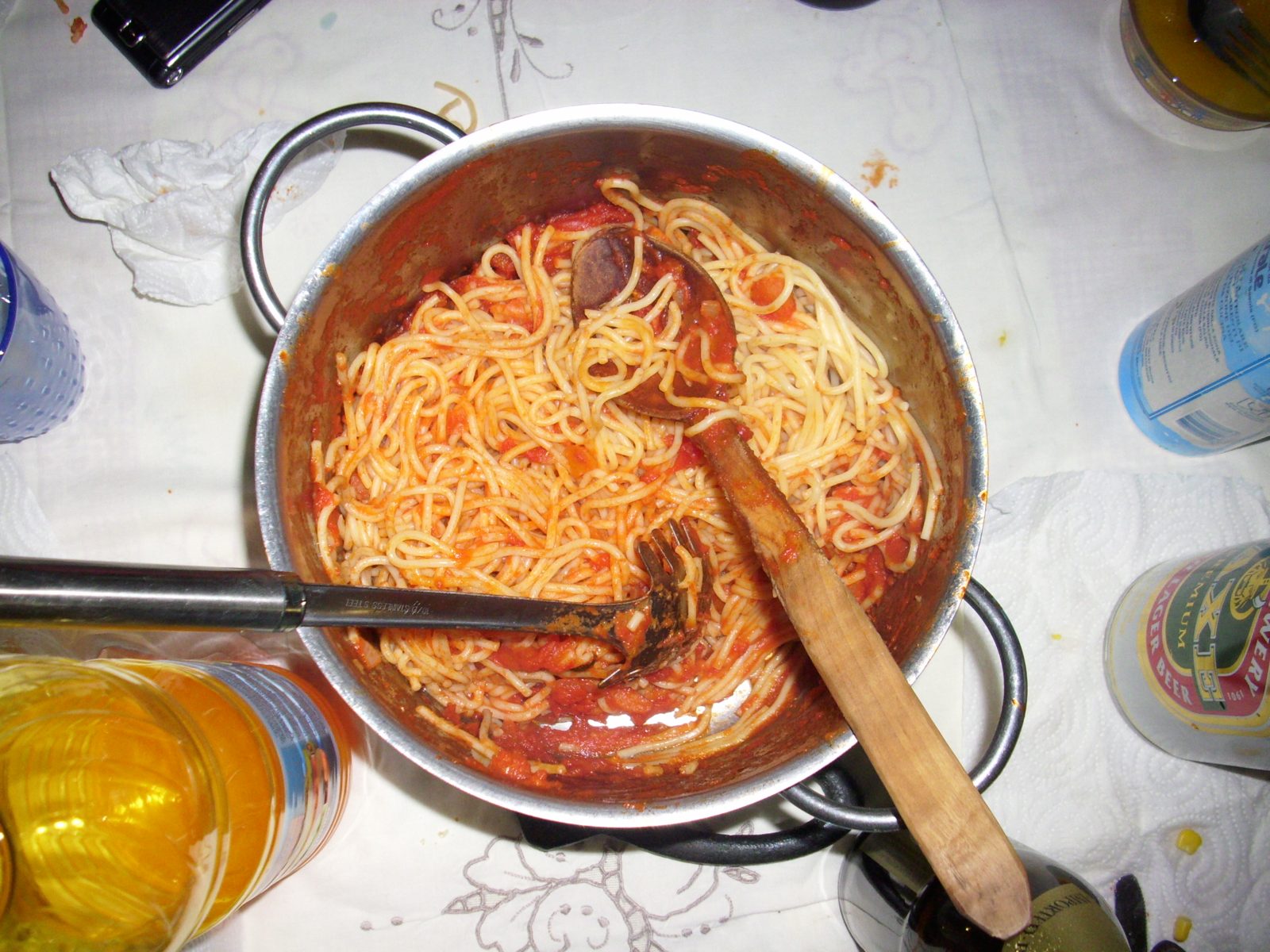 A plate of pasta with tomato sauce
