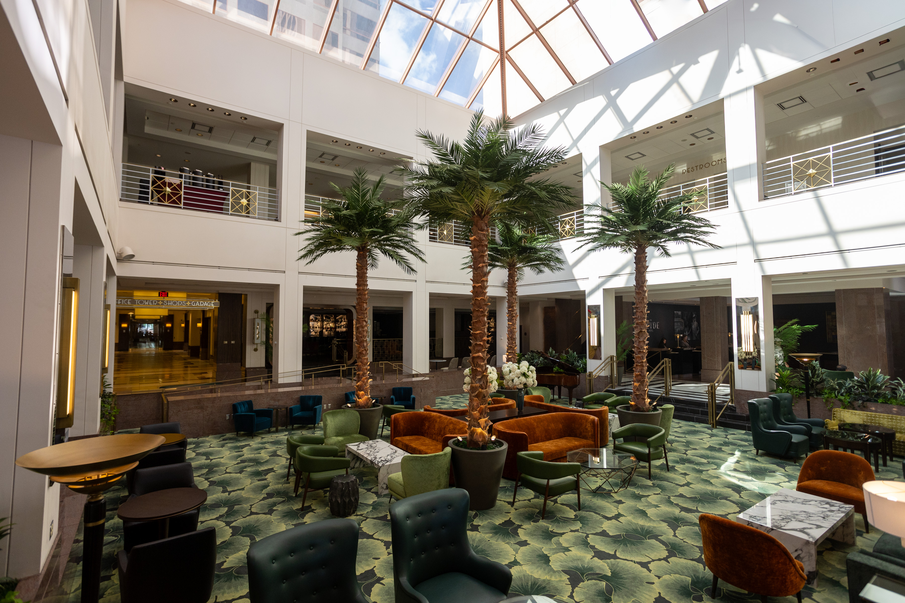 Hotel lobby with seating and front desk area