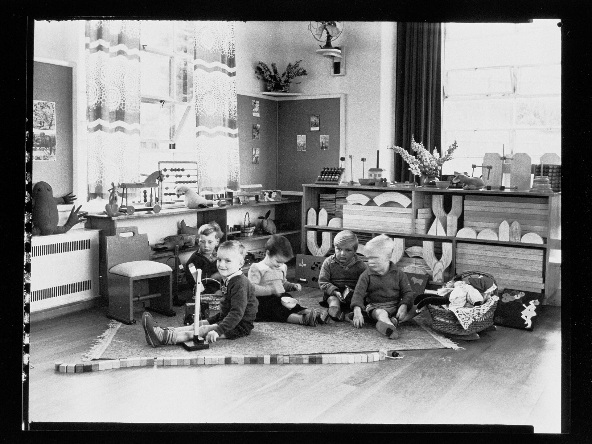 Children playing with blocks in a playroom