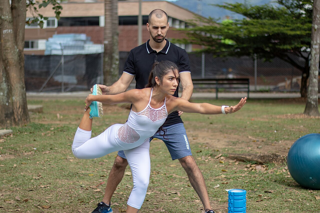 A personal training session with a balance exercise