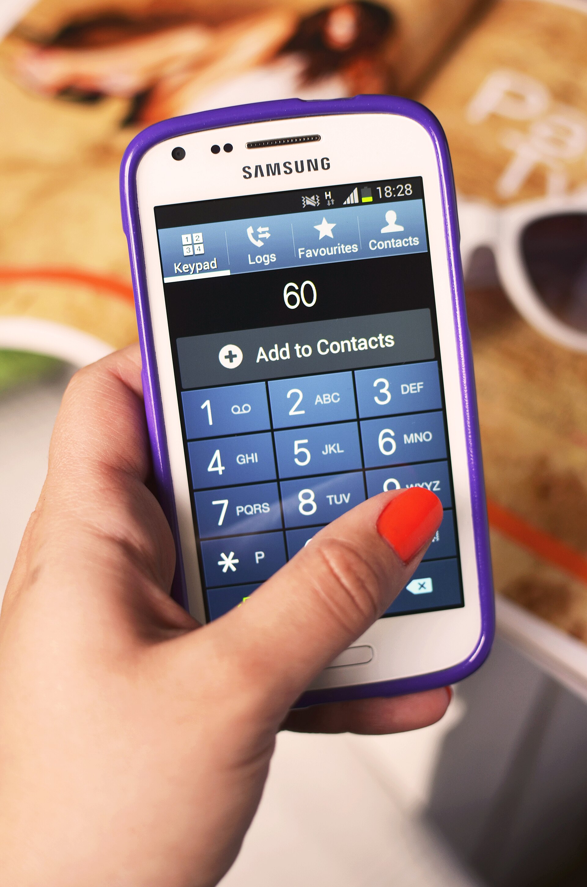 A Samsung phone showing a dialer keypad and an Add to Contacts option