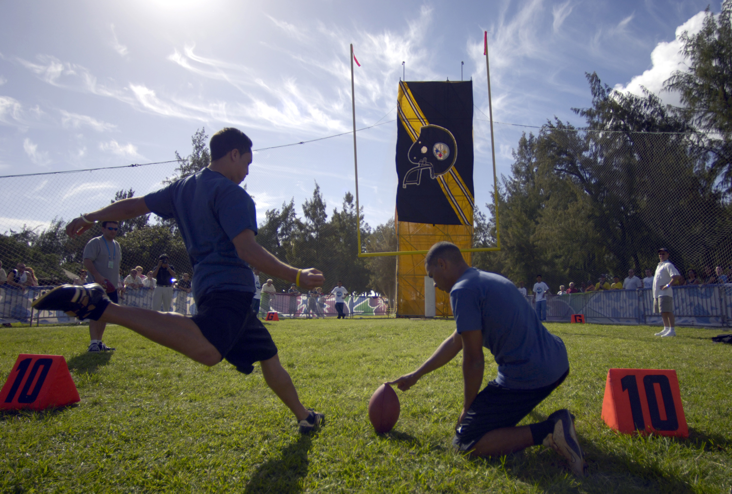 A placekicker lines up a field goal attempt in this file photo