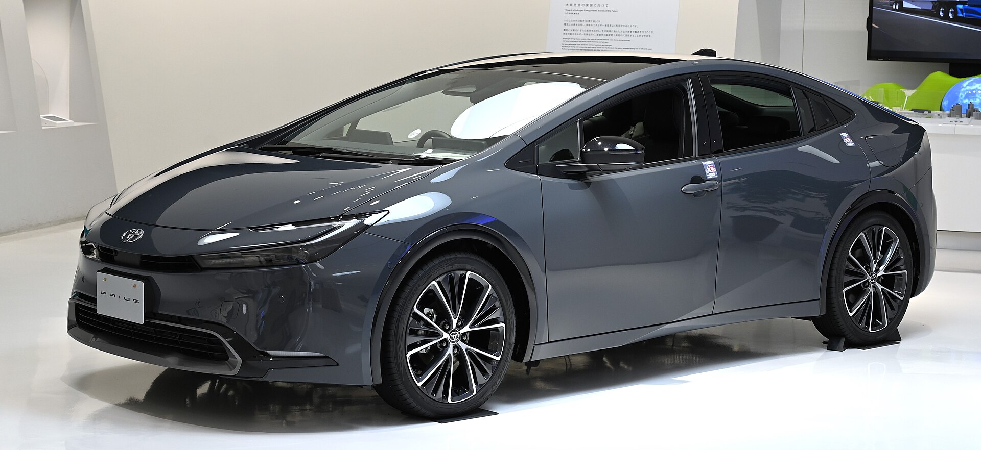 A grey Toyota Prius hybrid car on display