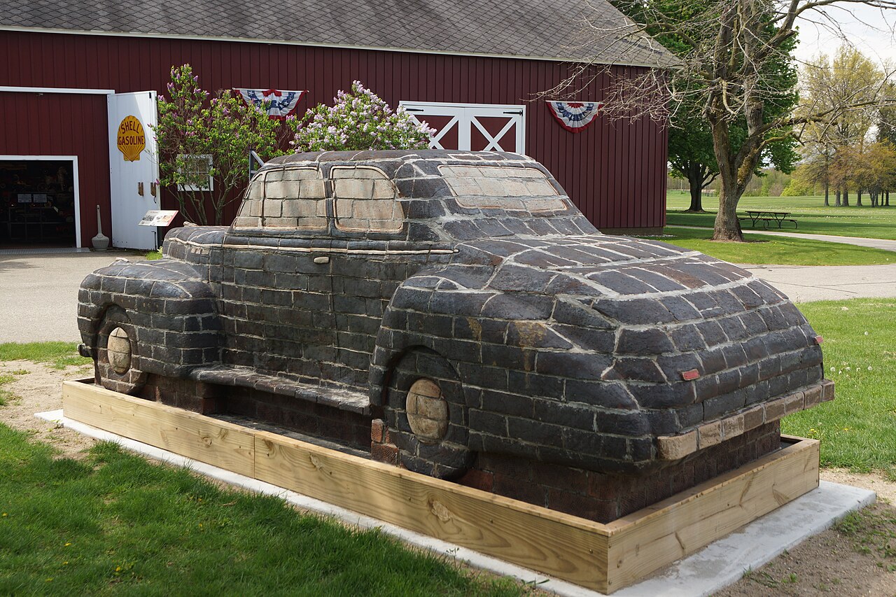 A vintage car on display at a car museum