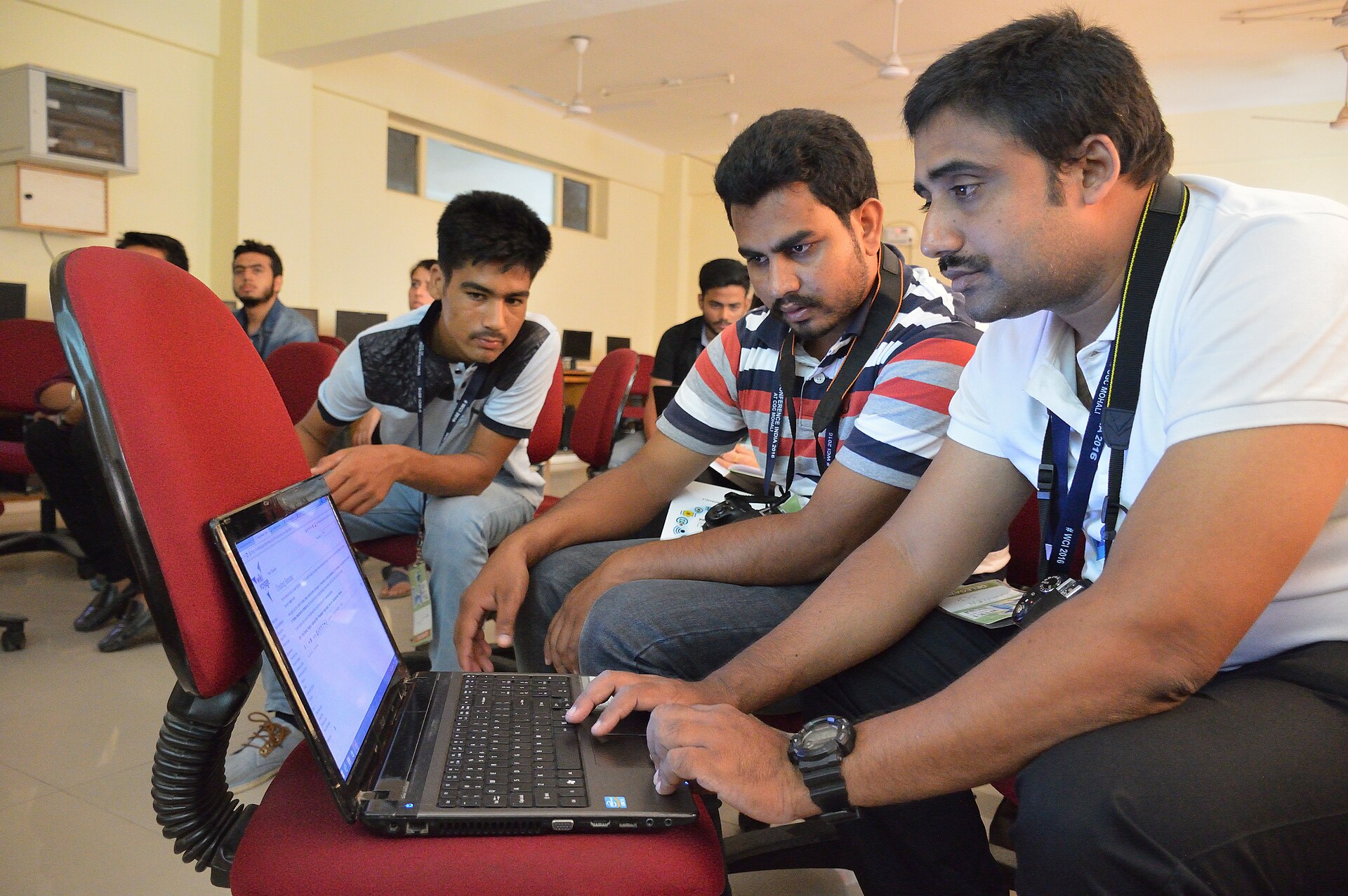 Participants studying together at a workshop