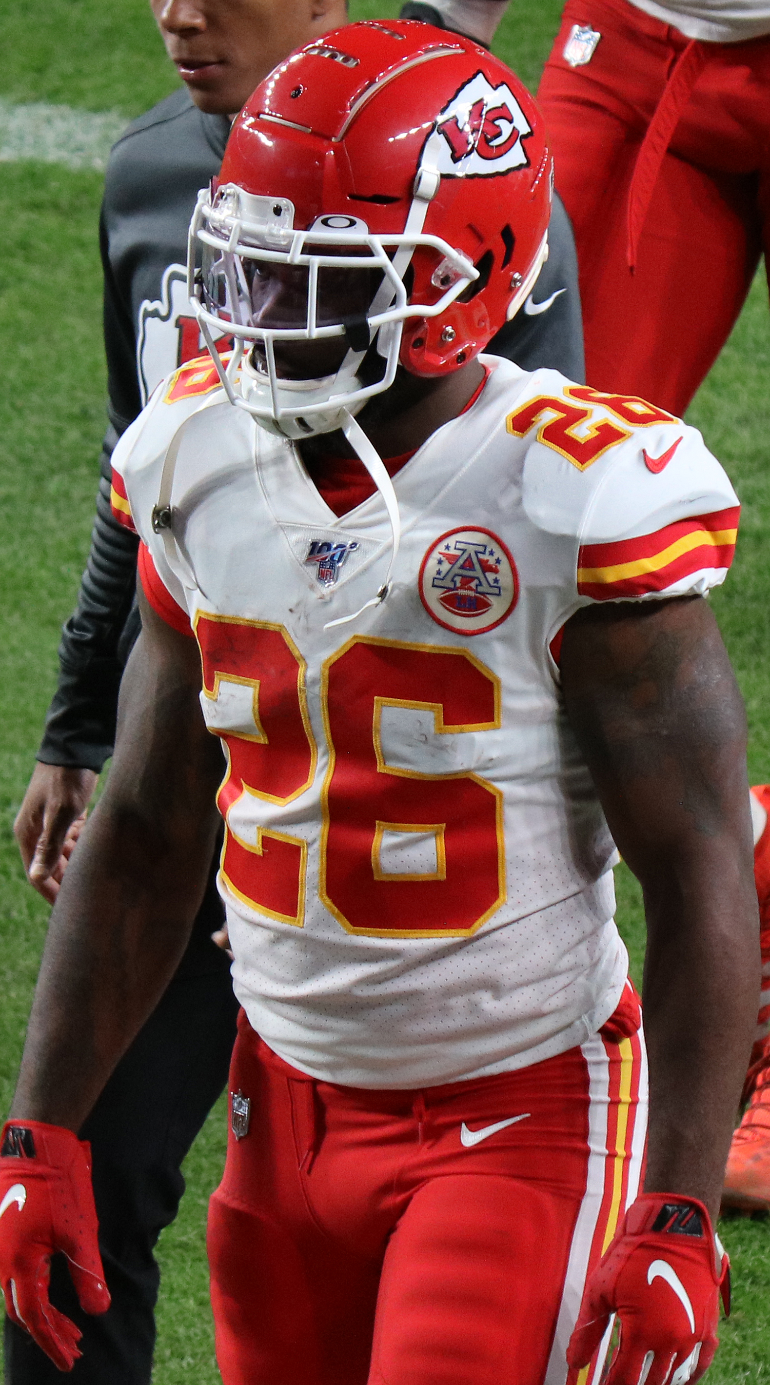 A running back carries the ball during a game