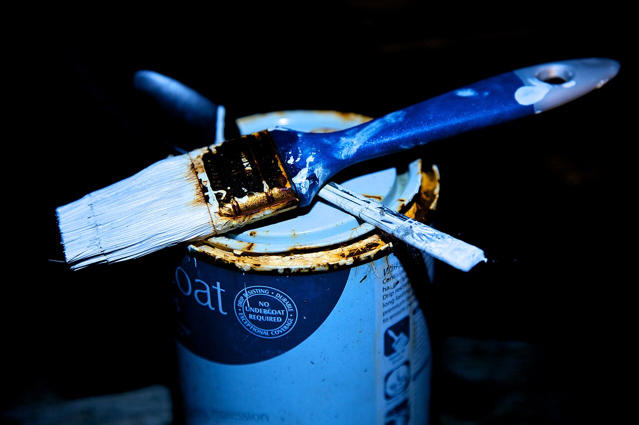 An old paint pot, the kind that rewards a careful seal and label