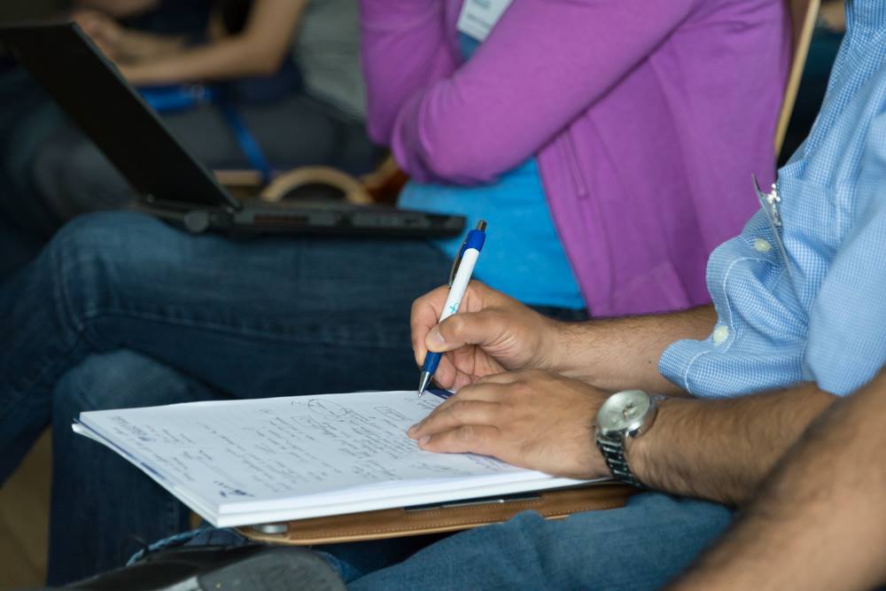 A student taking notes during a study session