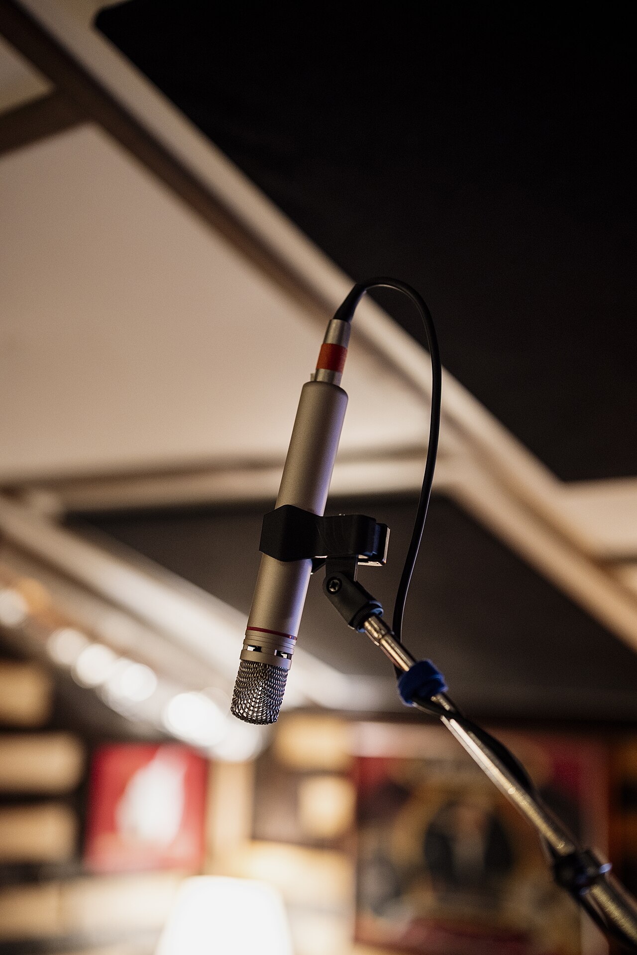 A close-up view of a microphone set up in a recording studio