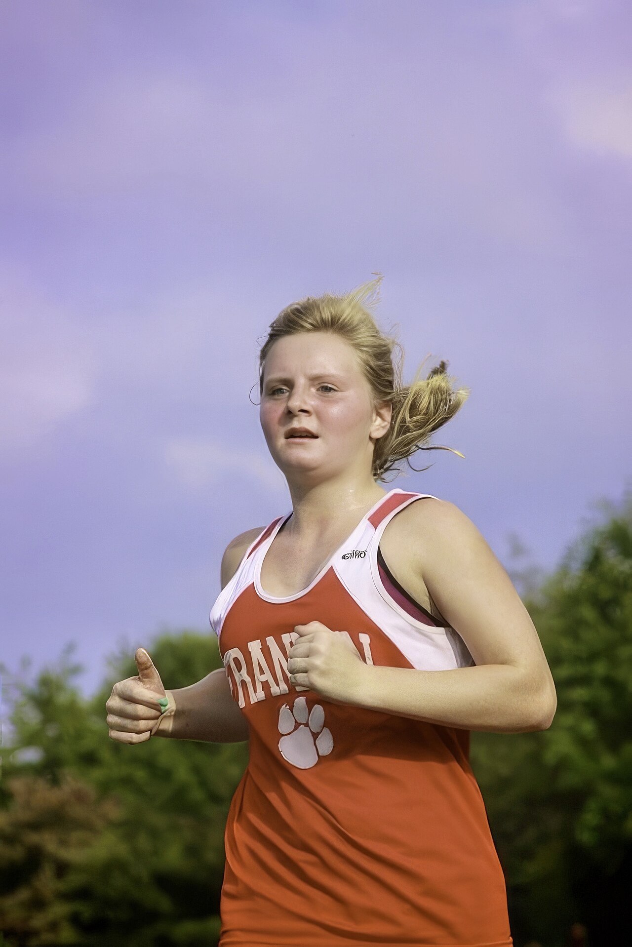 A cross-country runner races during a meet in North Carolina