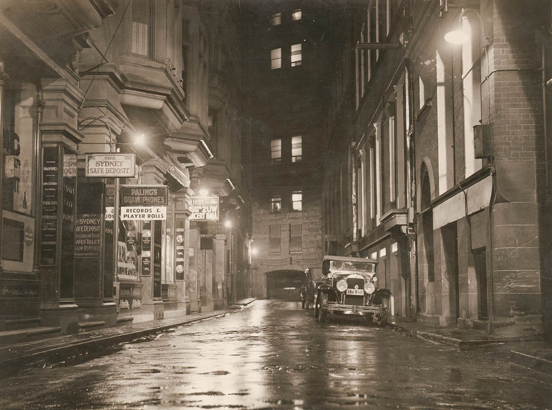 A wet street in Sydney in the 1930s